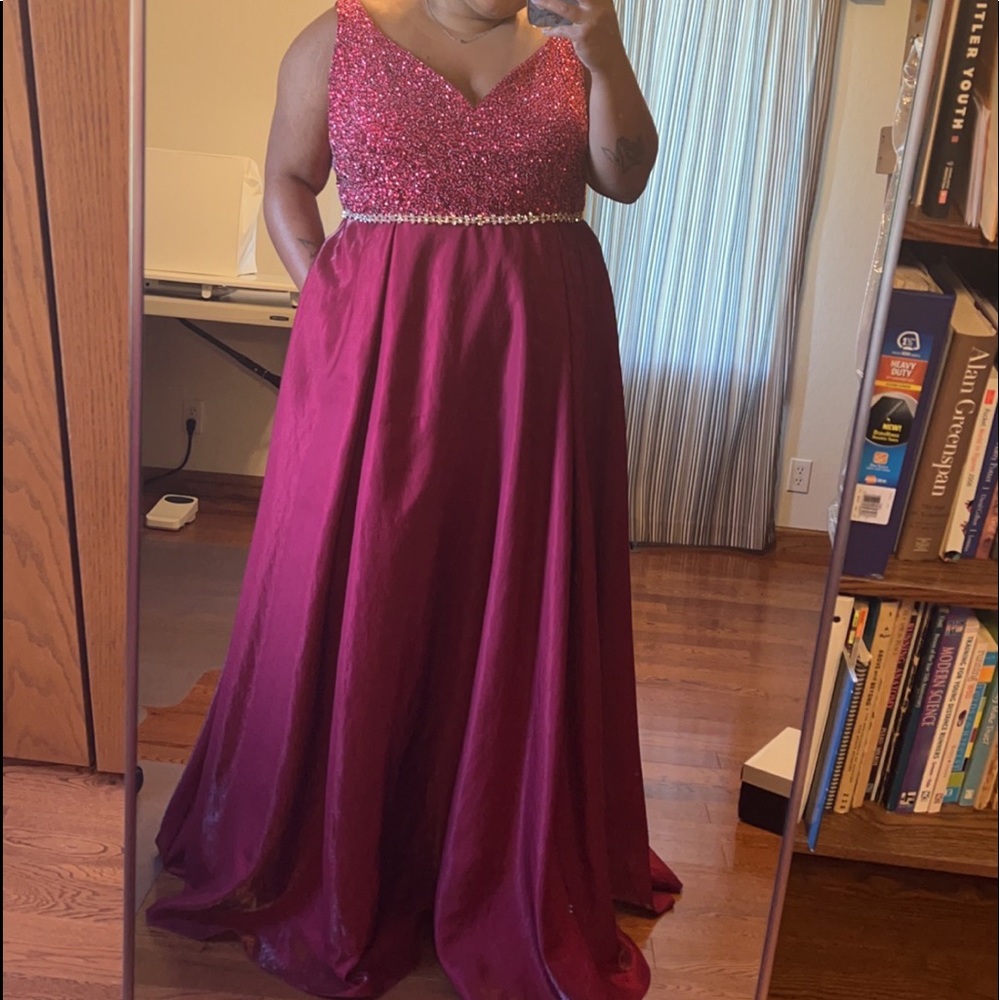originally a prom dress, worn for pageants. size 20, altered to an 18.